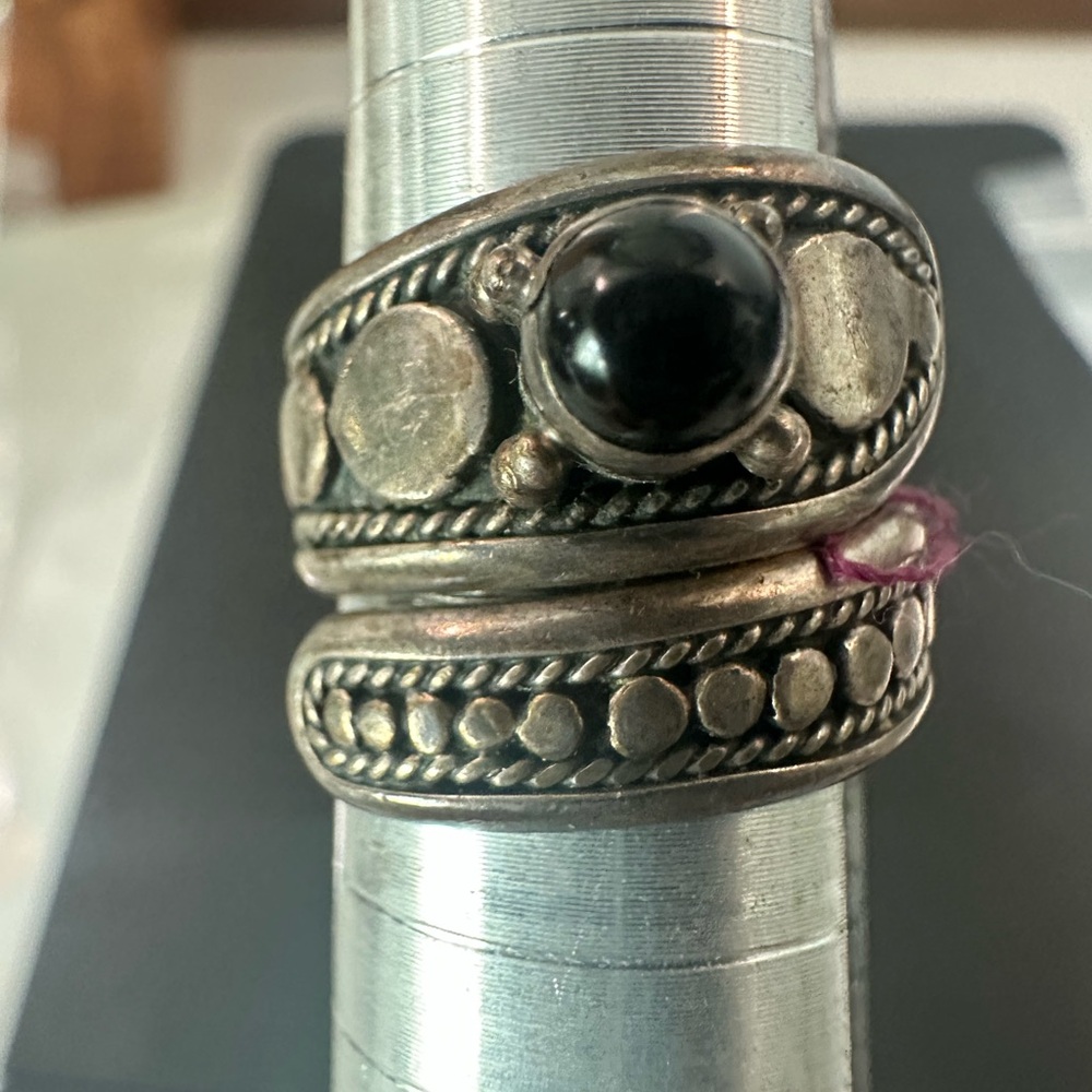 Silver and Black Onyx Ring with Intricate Detailing